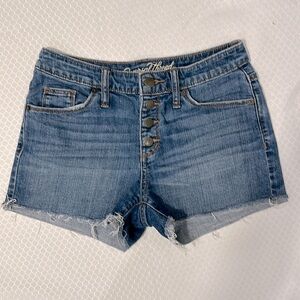 Soft medium blue denim, button fly, size 00 / 24R, 2.5 inch inseam, EUC